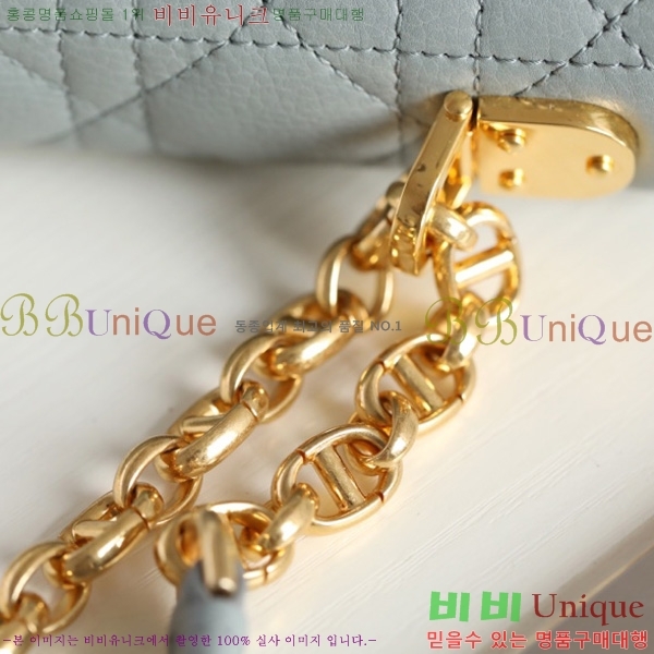 # ̴ īι M122500-4